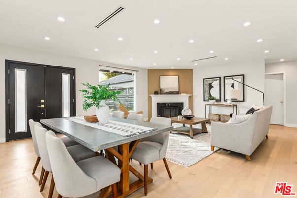 Dining room, Fireplace, Interior, Living room, Recessed Lighting, Wood Texture Flooring