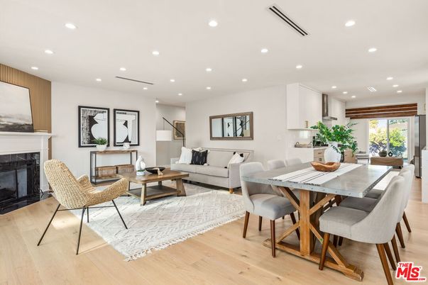Dining room, Fireplace, Interior, Living room, Recessed Lighting, Wood Texture Flooring