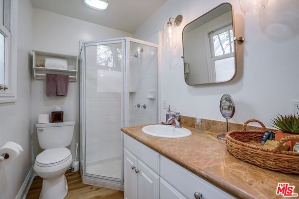 Bathroom, Dual Sink Vanities, Glass Shower, Interior, Wood Texture Flooring