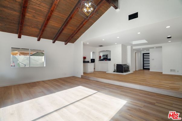 Empty room, Fireplace, Interior, Recessed Lighting, Wooden Beams, Wooden Ceilings, Wood Texture Flooring