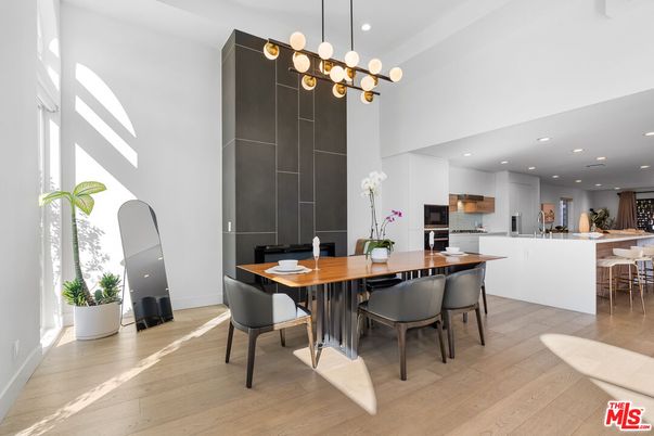 Dining room, Interior, Kitchen, Pendant Lights, Recessed Lighting, Stainless Steel Appliances, Wood Texture Flooring