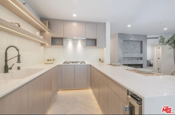 Interior, Kitchen, Marble Walls, Recessed Lighting, Stainless Steel Appliances, Wood Texture Flooring
