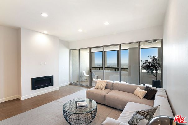 Fireplace, Interior, Living room, Recessed Lighting, Water, Wood Texture Flooring
