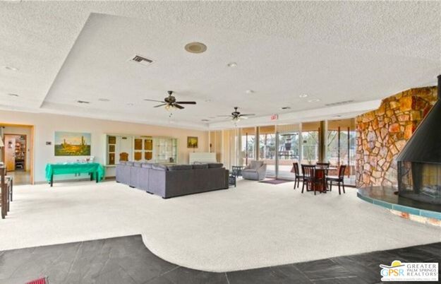 Dining room, Fireplace, Interior, Living room, Recessed Lighting, Stone Walls