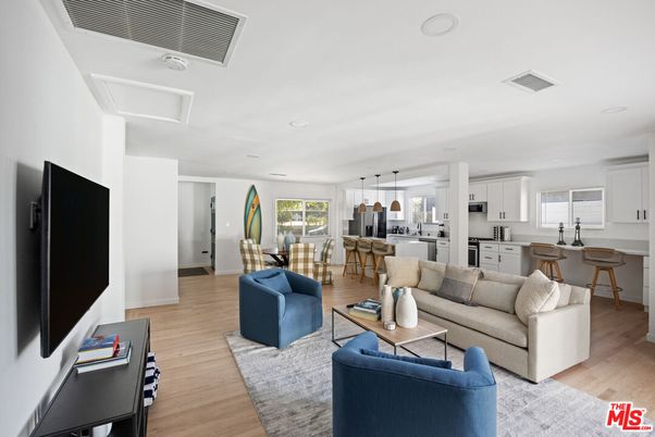 Dining room, Interior, Kitchen, Living room, Pendant Lights, Recessed Lighting, Stainless Steel Appliances, Wood Texture Flooring