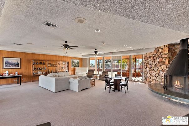 Dining room, Fireplace, Interior, Living room, Recessed Lighting, Stone Walls, Wooden Walls