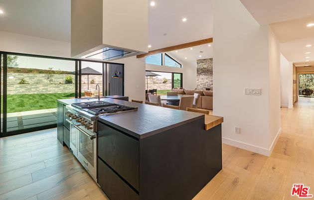 Dining room, Interior, Kitchen, Recessed Lighting, Stainless Steel Appliances, Wood Texture Flooring