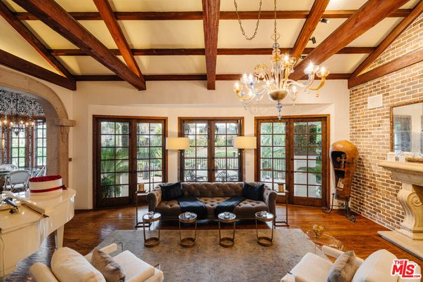 Chandelier, Fireplace, Interior, Living room, Stone Walls, Wooden Beams, Wood Texture Flooring