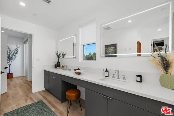Bathroom, Dual Sink Vanities, Interior, Recessed Lighting, Wood Texture Flooring
