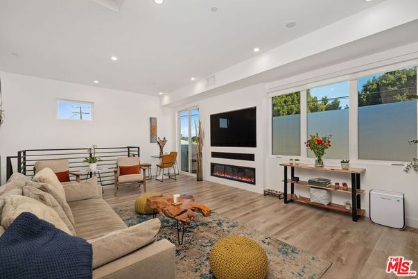Fireplace, Interior, Living room, Recessed Lighting, Wood Texture Flooring
