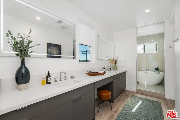 Bathroom, Dual Sink Vanities, Glass Shower, Interior, Recessed Lighting, Wood Texture Flooring