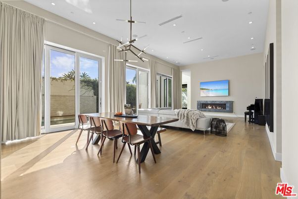Dining room, Fireplace, Interior, Living room, Pendant Lights, Recessed Lighting, Wood Texture Flooring