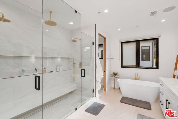 Bathroom, Free Standing Baths, Glass Shower, Interior, Marble, Marble Walls, Recessed Lighting