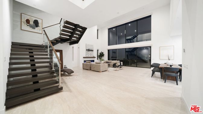 Dining room, Fireplace, Interior, Living room, Recessed Lighting, Wood Texture Flooring