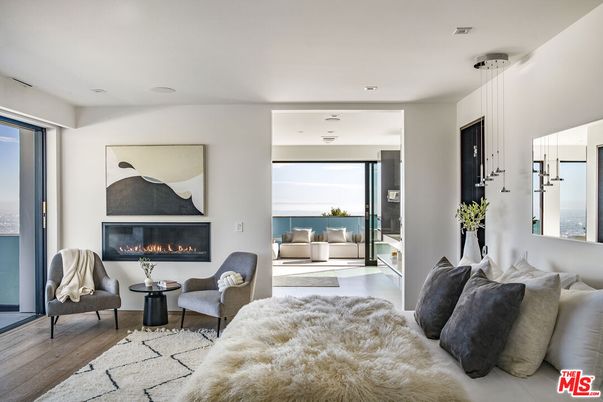 Fireplace, Interior, Living room, Pendant Lights, Recessed Lighting, Water, Wood Texture Flooring