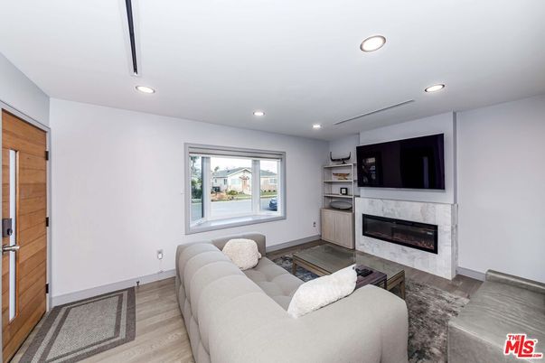 Fireplace, Interior, Living room, Recessed Lighting, Wood Texture Flooring