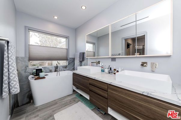 Bathroom, Dual Sink Vanities, Free Standing Baths, Interior, Recessed Lighting, Wood Texture Flooring