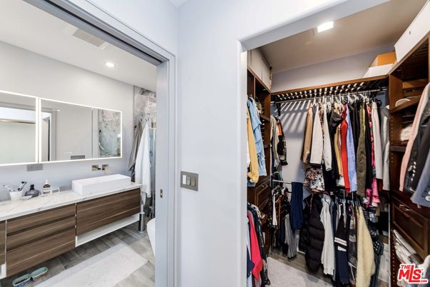 Bathroom, Dual Sink Vanities, Interior, Recessed Lighting, Walk-in Closets, Wood Texture Flooring