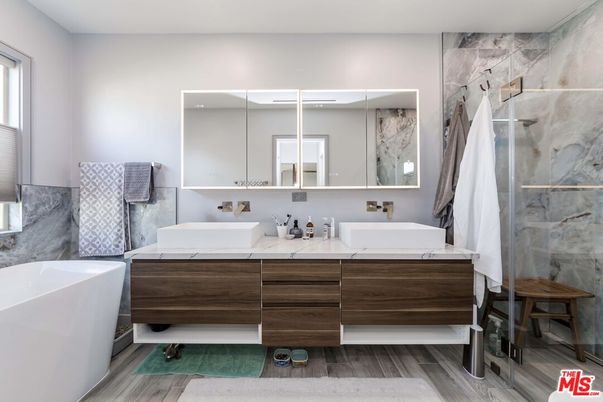 Bathroom, Dual Sink Vanities, Free Standing Baths, Interior, Marble Walls, Wood Texture Flooring