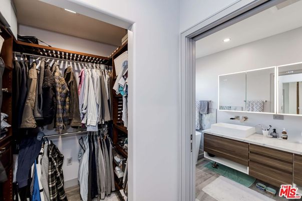 Bathroom, Dual Sink Vanities, Interior, Recessed Lighting, Walk-in Closets, Wood Texture Flooring
