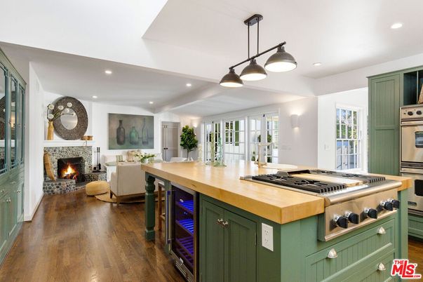 Fireplace, Interior, Kitchen, Living room, Pendant Lights, Recessed Lighting, Stainless Steel Appliances, Wood Texture Flooring
