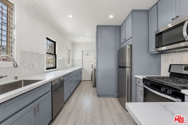 Interior, Kitchen, Recessed Lighting, Stainless Steel Appliances, Wood Texture Flooring