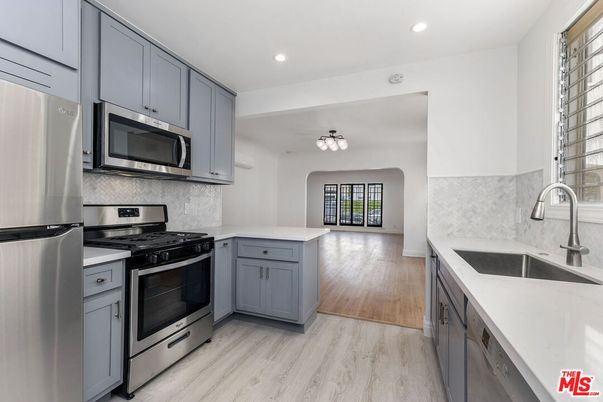 Interior, Kitchen, Recessed Lighting, Stainless Steel Appliances, Wood Texture Flooring