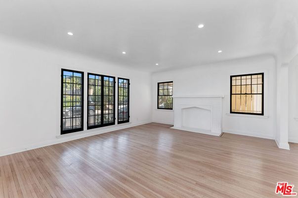 Empty room, Fireplace, Interior, Recessed Lighting, Wood Texture Flooring