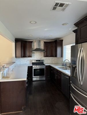 Interior, Kitchen, Recessed Lighting, Stainless Steel Appliances, Stone Walls, Wood Texture Flooring