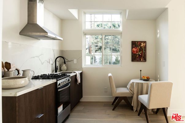 Dining room, Interior, Kitchen, Marble Walls, Stainless Steel Appliances, Wood Texture Flooring