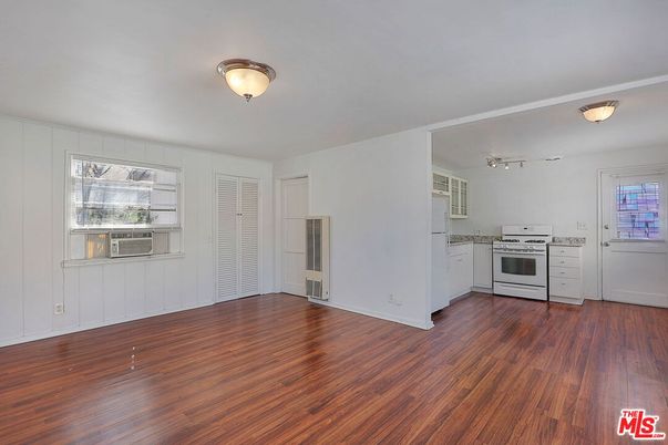 Empty room, Interior, Kitchen, Stainless Steel Appliances, Wood Texture Flooring