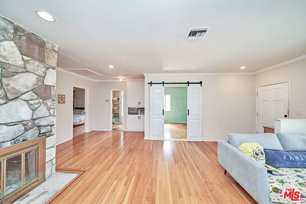 Fireplace, Interior, Recessed Lighting, Stone Walls, Wood Texture Flooring