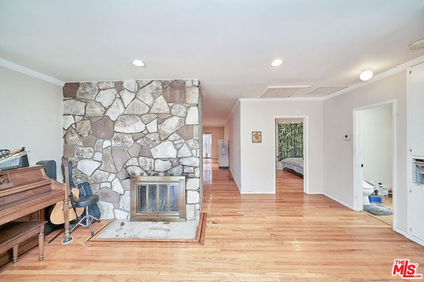 Fireplace, Interior, Piano, Recessed Lighting, Stone Walls, Wood Texture Flooring