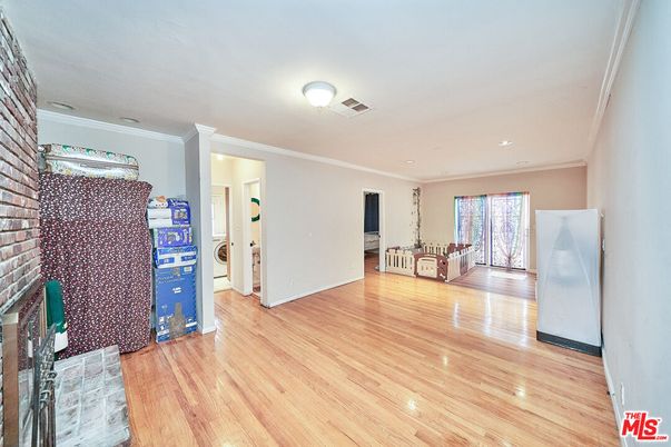 Empty room, Fireplace, Interior, Recessed Lighting, Washer, Wood Texture Flooring