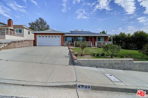 Attached, Exterior, Facade, Brick Facade, Solar Panels, Ranch