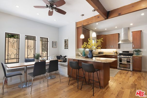 Dining room, Interior, Kitchen, Pendant Lights, Recessed Lighting, Stainless Steel Appliances, Wooden Beams, Wood Texture Flooring