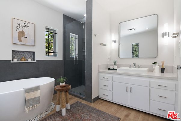 Bathroom, Dual Sink Vanities, Free Standing Baths, Glass Shower, Interior, Recessed Lighting, Wood Texture Flooring