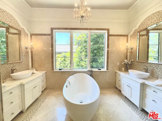 Bathroom, Chandelier, Dual Sink Vanities, Free Standing Baths, Glass Shower, Interior