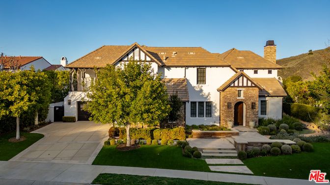 Attached, Backyard, Exterior, Facade, Brick Facade, Tudor Revival