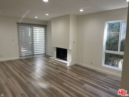 Empty room, Fireplace, Interior, Recessed Lighting, Wood Texture Flooring