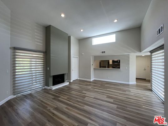 Empty room, Fireplace, Interior, Recessed Lighting, Wood Texture Flooring