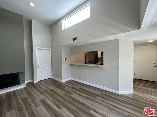 Empty room, Fireplace, Interior, Recessed Lighting, Wood Texture Flooring