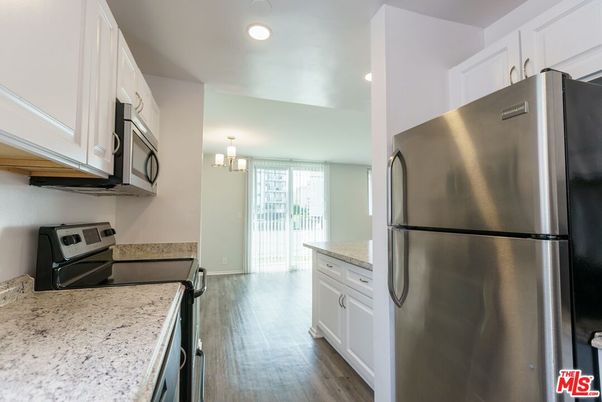 Chandelier, Interior, Kitchen, Recessed Lighting, Stainless Steel Appliances, Wood Texture Flooring
