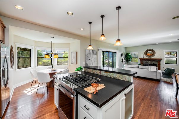 Dining room, Fireplace, Interior, Kitchen, Living room, Pendant Lights, Recessed Lighting, Wood Texture Flooring