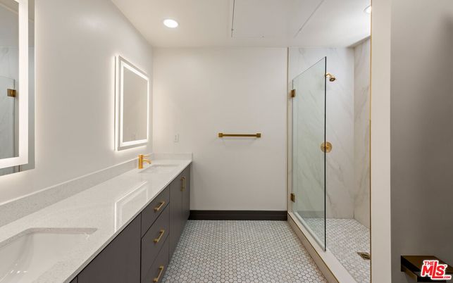 Bathroom, Dual Sink Vanities, Glass Shower, Interior, Marble Walls, Recessed Lighting