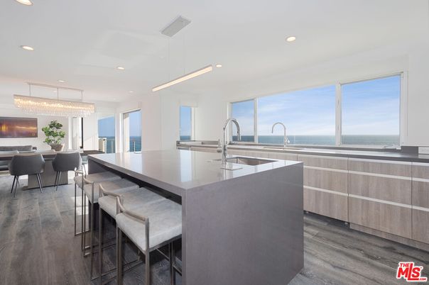 Chandelier, Dining room, Interior, Kitchen, Pendant Lights, Recessed Lighting, Water, Wood Texture Flooring