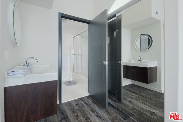 Bathroom, Dual Sink Vanities, Glass Shower, Interior, Wood Texture Flooring