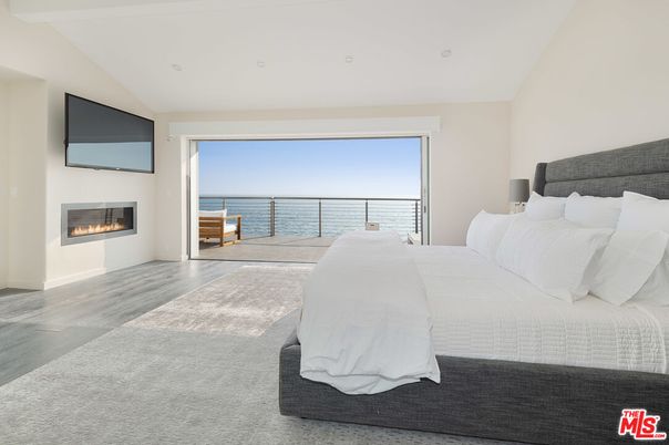 Bedroom, Fireplace, Interior, Recessed Lighting, Water, Wood Texture Flooring