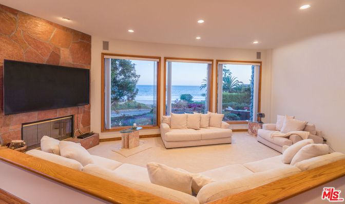Fireplace, Interior, Living room, Recessed Lighting, Stone Walls, Water