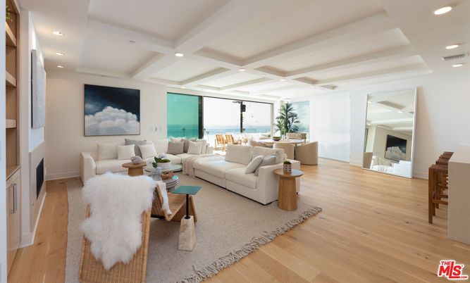 Dining room, Fireplace, Interior, Living room, Recessed Lighting, Water, Wood Texture Flooring